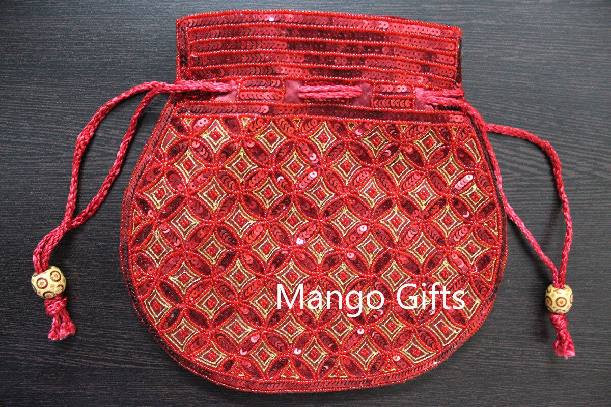 Beautiful red handmade Indian Potli bag with sequins, perfect for fashion and carrying small articles.